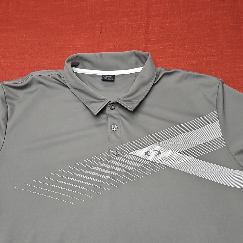3/$35 Oakley Gray Polo Shirt with Striped Design